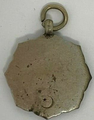 1904  Victory Commemorative Watch Fob 明治丗七年戰捷記念章.jpg