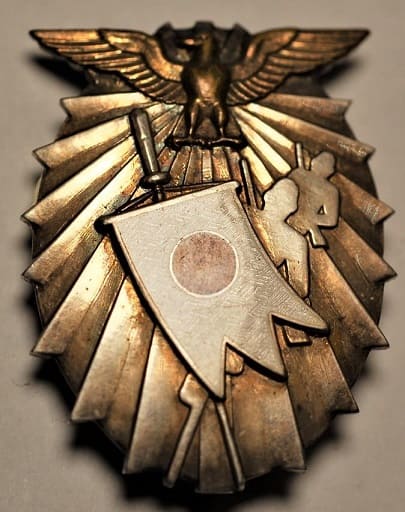 1939 Youth School National Defense Motorized Vehicle March Badge 主催大阪毎日新聞社青年學校國防自轉車行軍章.jpg