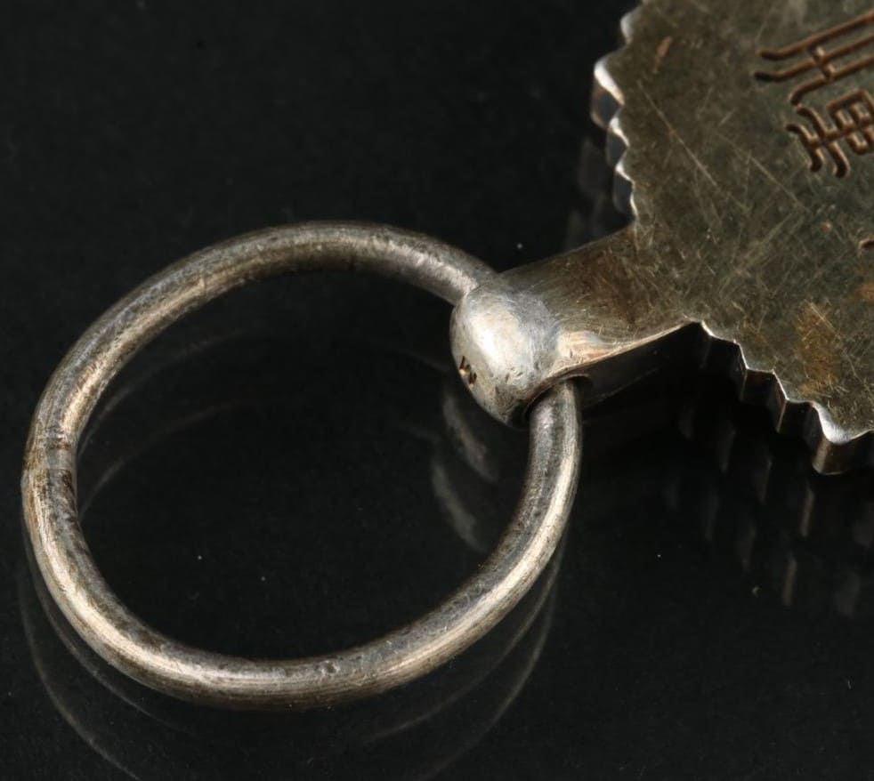 1st class Order of the Auspicious Clouds made by Japanese Mint  marked M.jpg