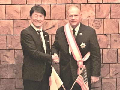 1st class Rising Sun order awarded in 2019 to General Robert Blake Neller.jpg