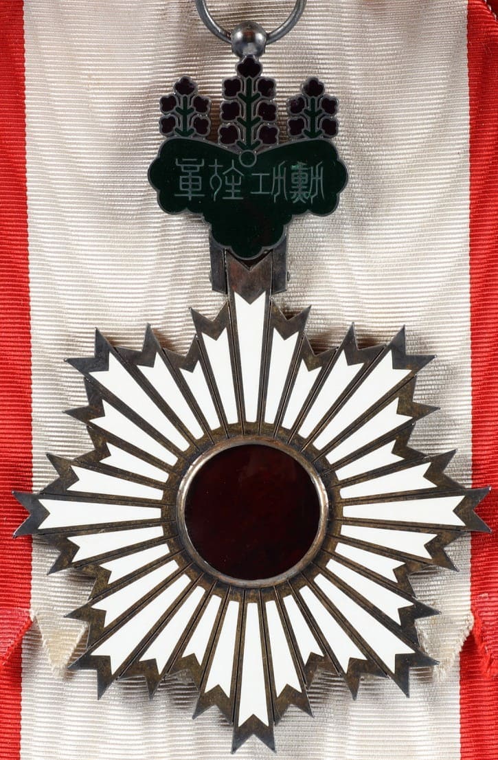 1st  class Rising Sun order marked M.jpg
