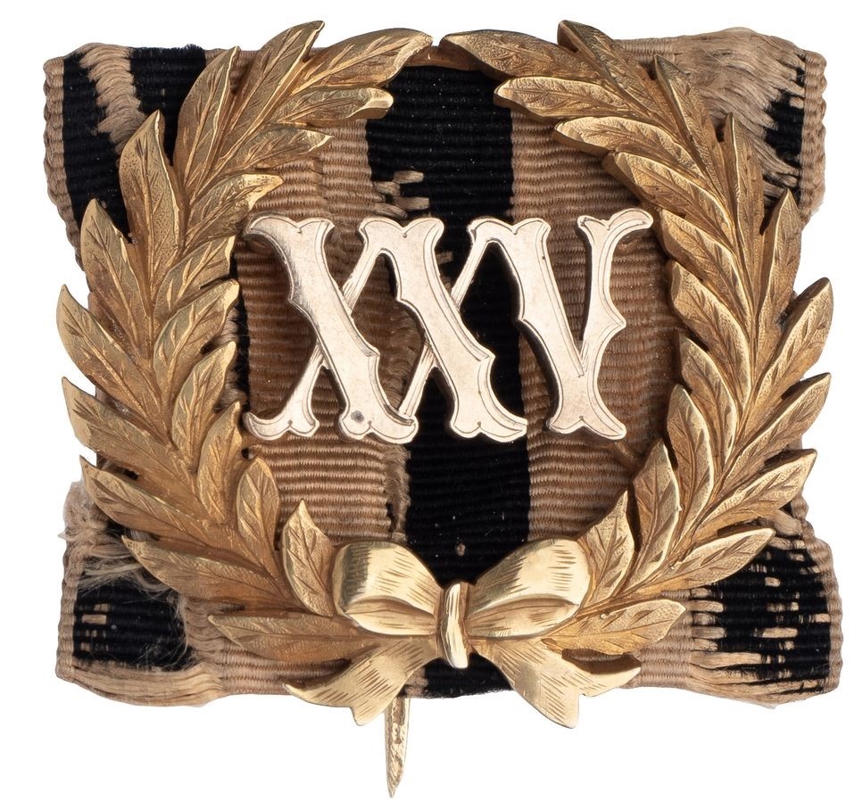25 years of service on St.George ribbon badge.jpg