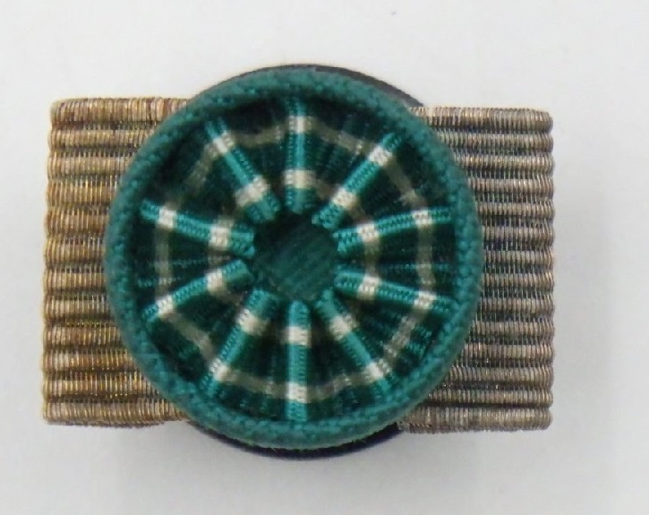 2nd class Golden Kite order breast star from  1942-1945 time period.jpg