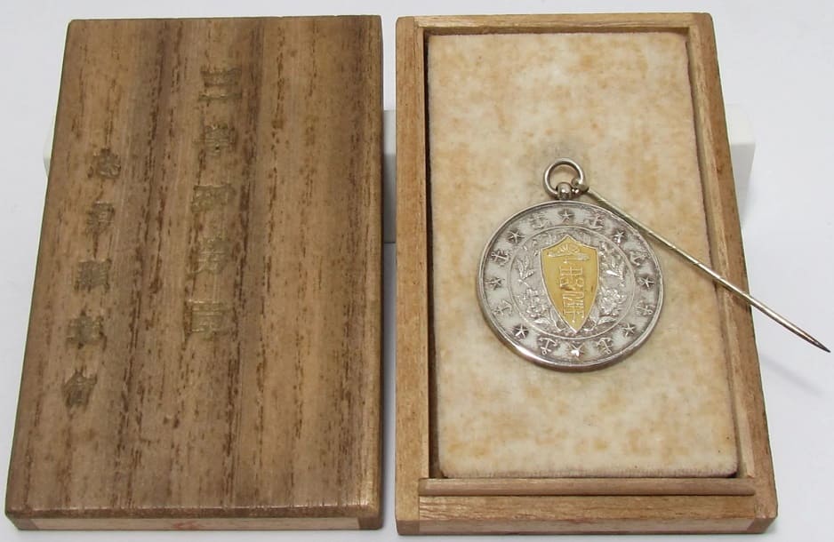 3rd class badge.jpg