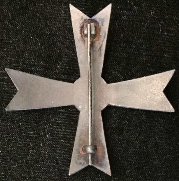 3rd  class Manchukuo Military Merit Badge.jpg