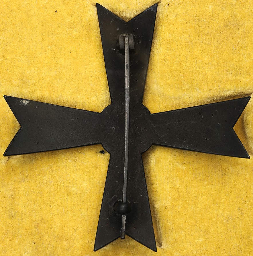 3rd  Class Manchukuo Military Merit Badge 大満州国武功徽章.jpg