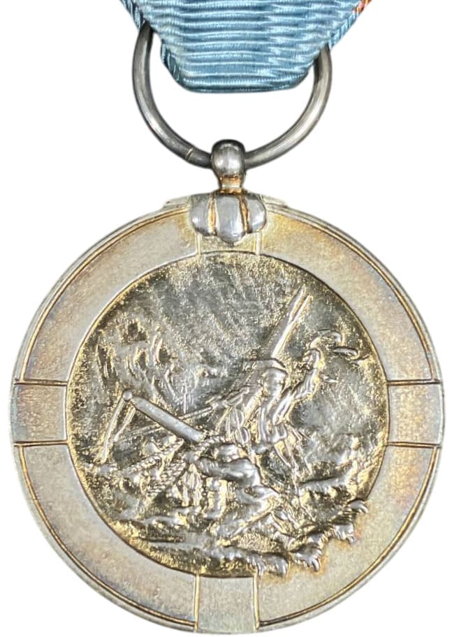 3rd class medal made by Hattori.jpg