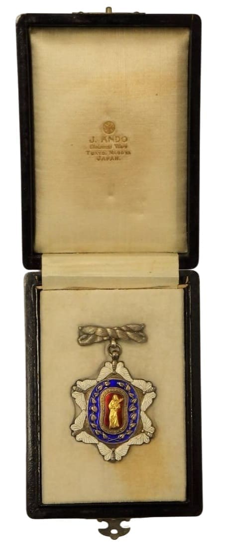 3rd class Meritorious Service Badge of Great Japan Sericulture Association.jpg