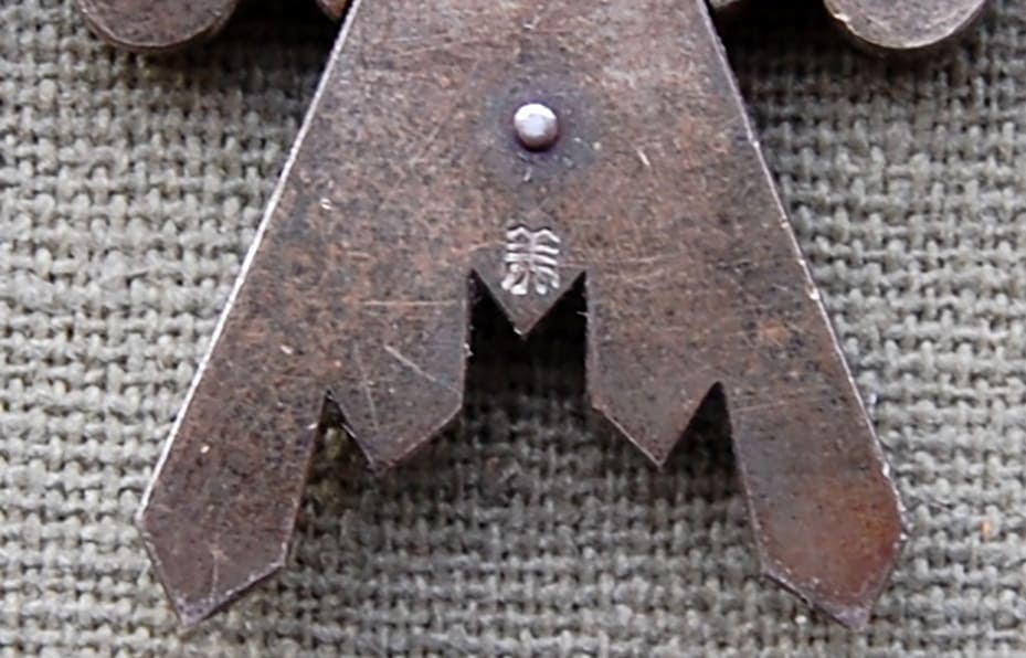 3rd class  Order of   Sacred Treasure  with mark 美.jpg