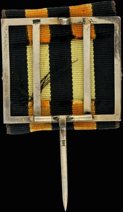 40 years of  impeccable service. On the St. George  ribbon.jpg