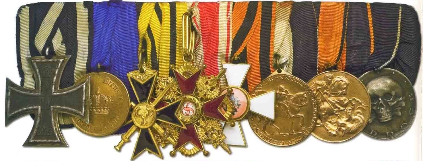 4th class cross inside of the medal bar of unknown German Freikorps veteran..jpg