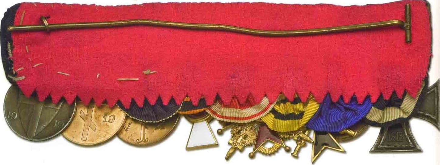 4th class cross inside of the  medal bar of unknown German Freikorps veteran..jpg
