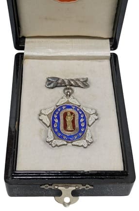 4th class Meritorious Service Badge  of Great Japan Sericulture Association.jpg