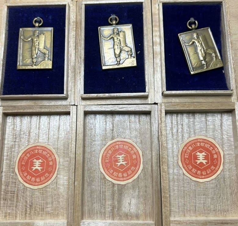 Award watch fobs made for Hochi  Shimbun newspaper.jpg