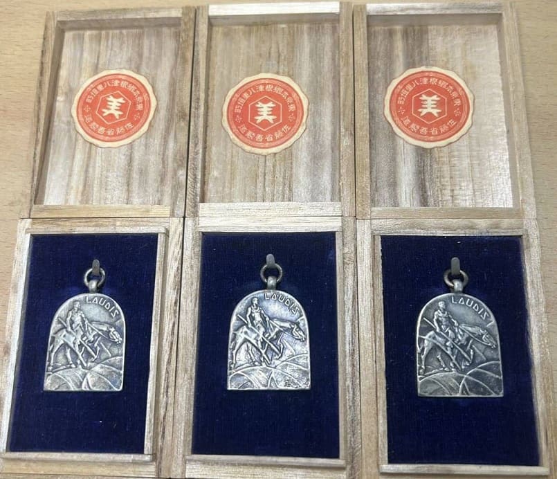 Award watch fobs made for Hochi  Shimbun  newspaper.jpg