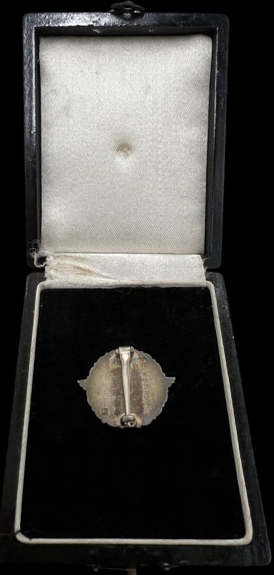 Badge for  20 Years of Continuous Service.jpg