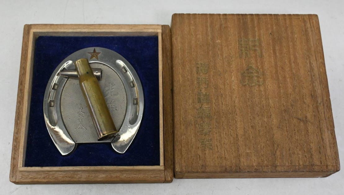 Bullet Case on a Horseshoe Commemorative  Paperweight.jpg