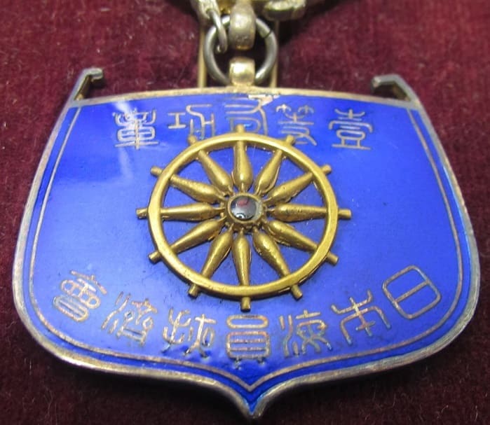 Cased 1st class badge made by Tokyo Medal Works.jpg