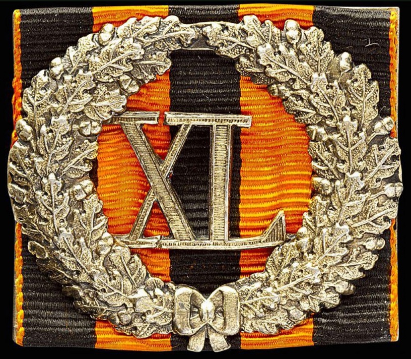 Cased badge for 40 years of service on St.George ribbon.jpg