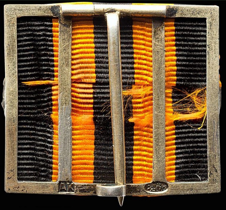 Cased badge for  40 years of service on St.George ribbon.jpg