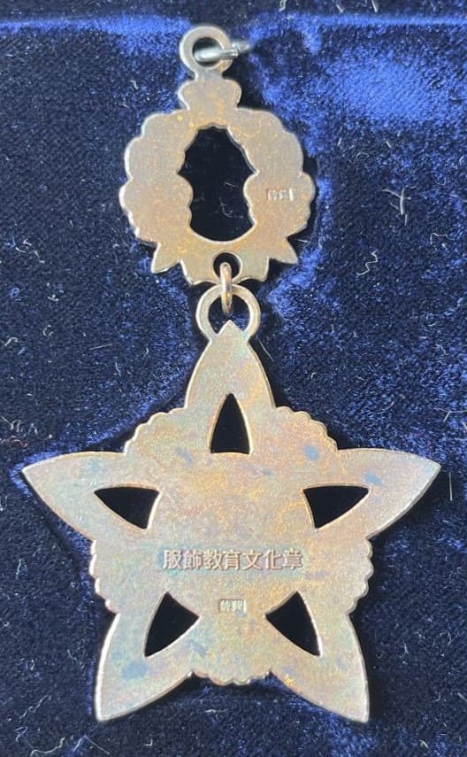 Clothing  Education Culture Silver Medal 服飾教育文化章.jpg