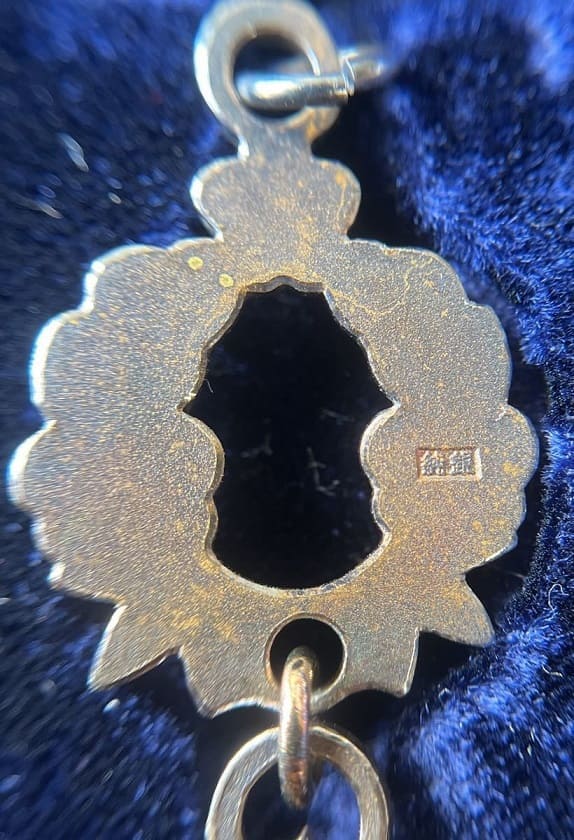 Clothing Education  Culture   Silver Medal 服飾教育文化章.jpg