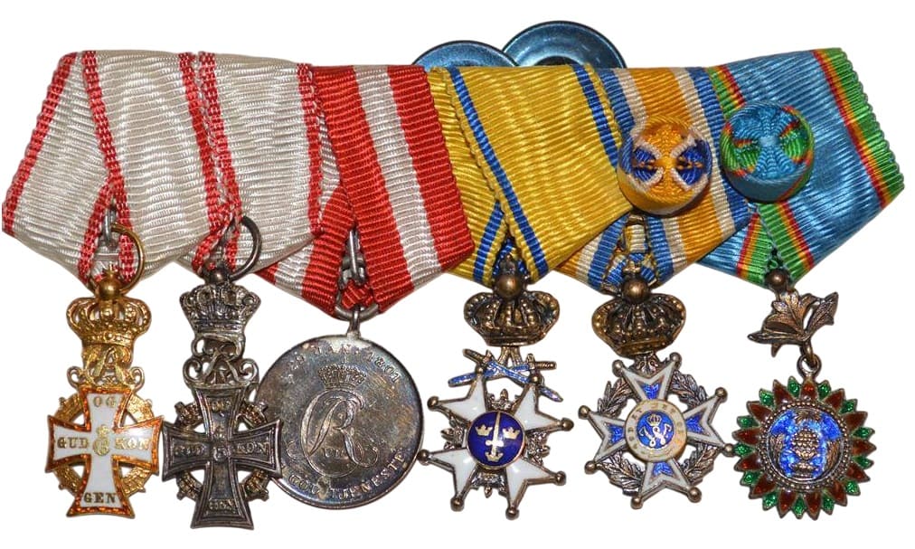 Danish group of miniatures with 1st type Order of the Crown.jpg
