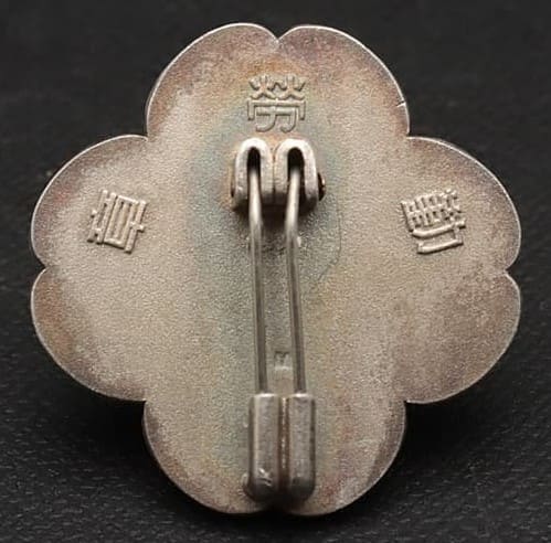 Diligent  Labor Badge marked M.jpg