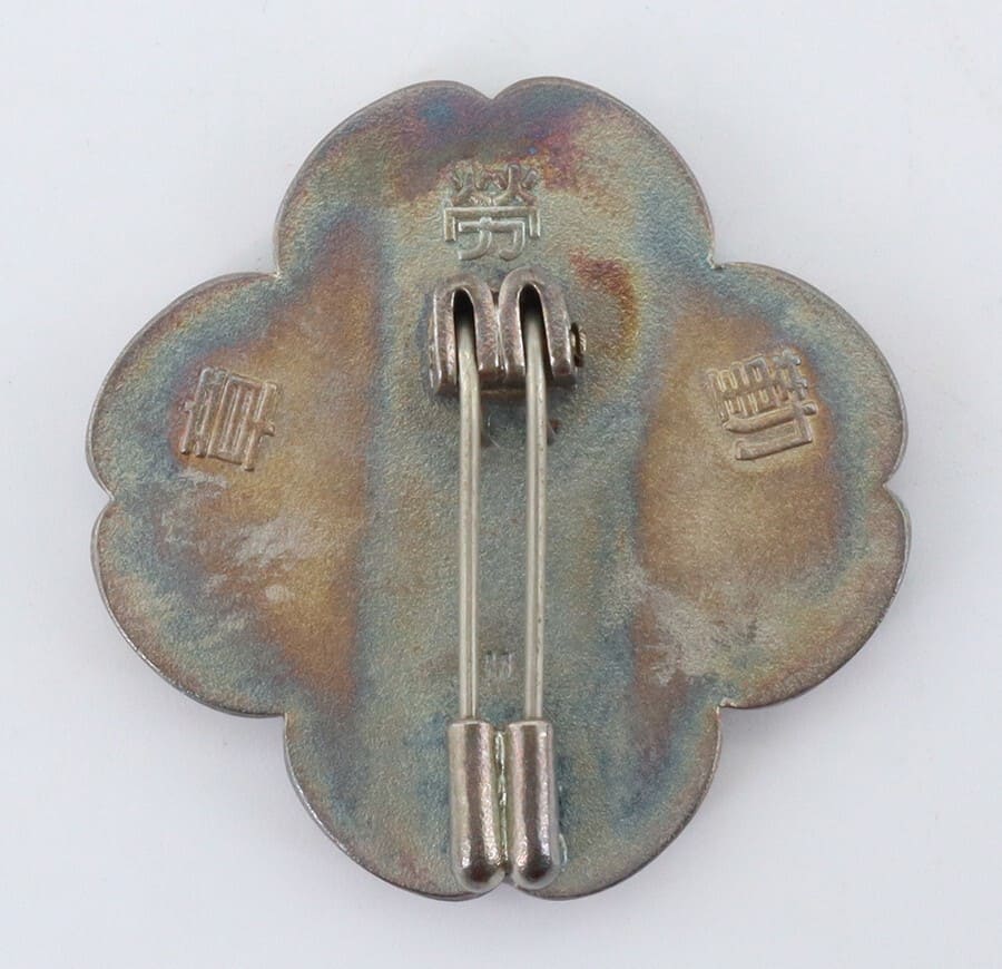 Diligent labor badge marked  M.jpg