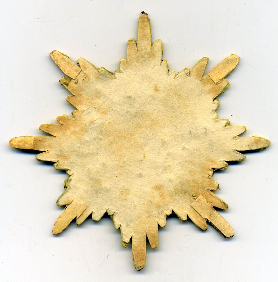 embroidered breast star of  White Eagle order.jpg