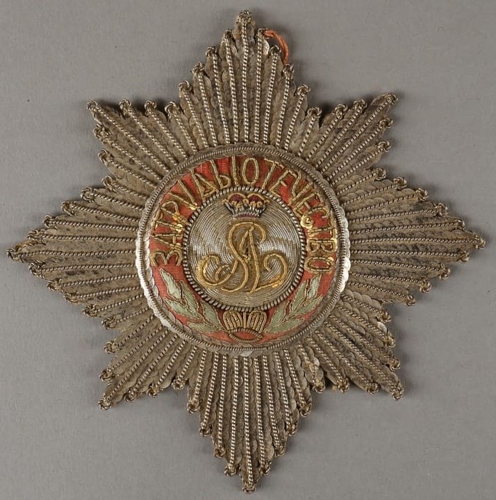 Embroidered breast stars of Saint Alexander Nevsky order.jpg