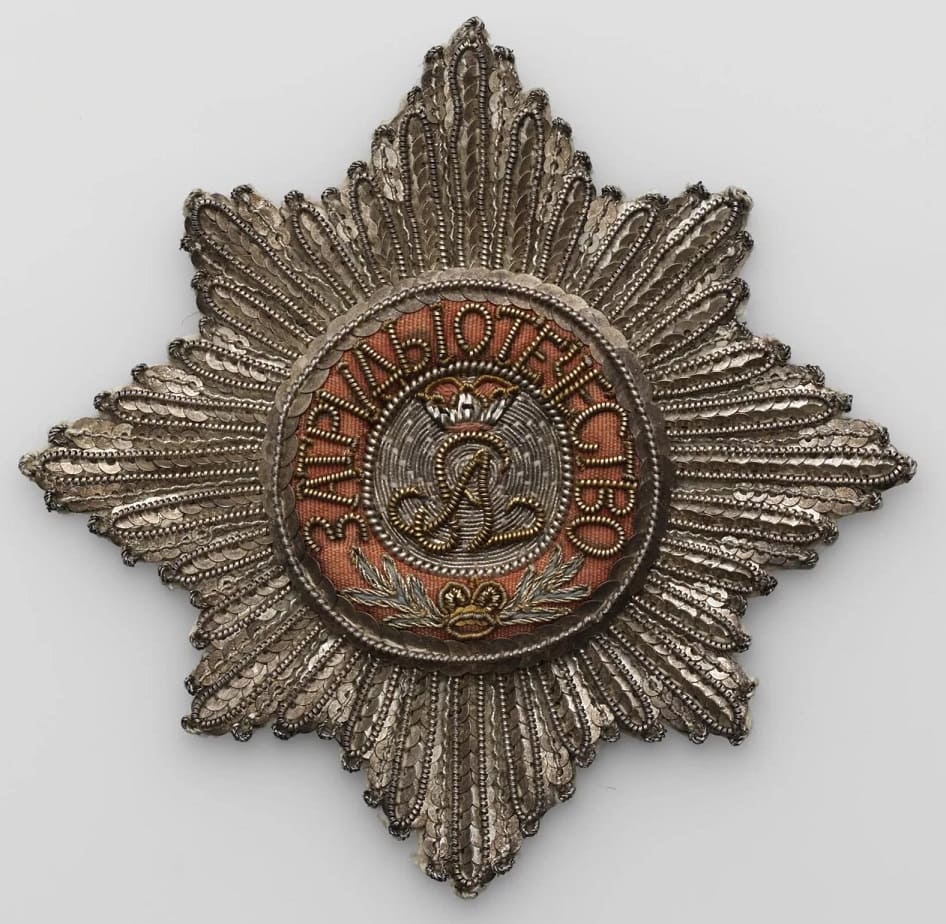Embroidered breast stars of Saint Alexander Nevsky order.jpg