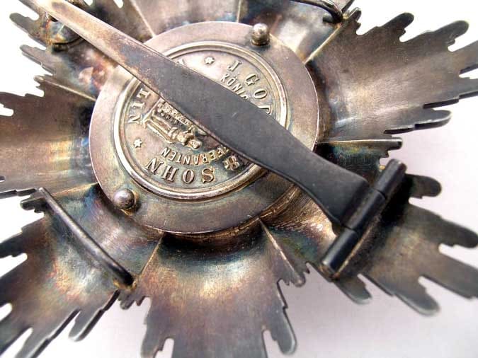 Fake breast star of Black  Eagle order.jpg