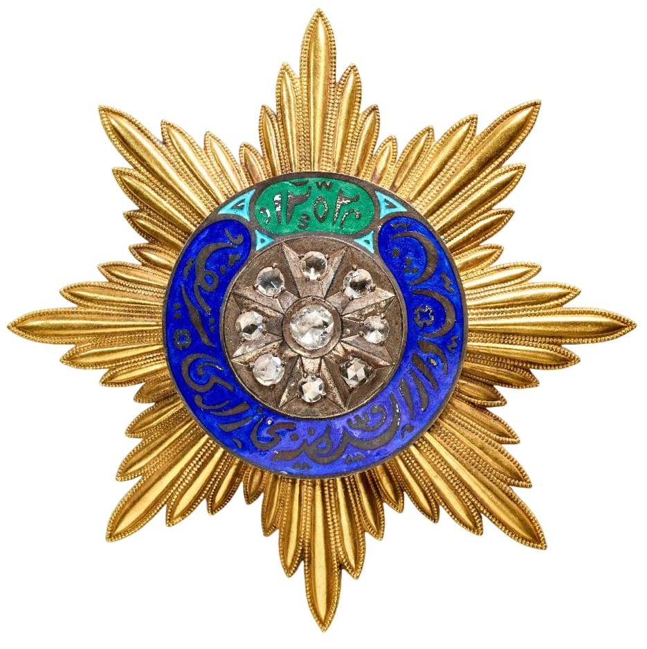 Fake gold breast star with diamonds.jpg