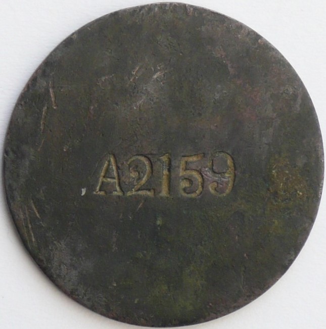 Fake Manchukuo Wound Badge..jpg