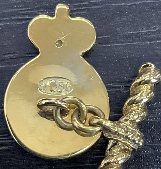fake set of cufflinks in the form of 4th class Saint Anna order for  Non-Christians.jpg