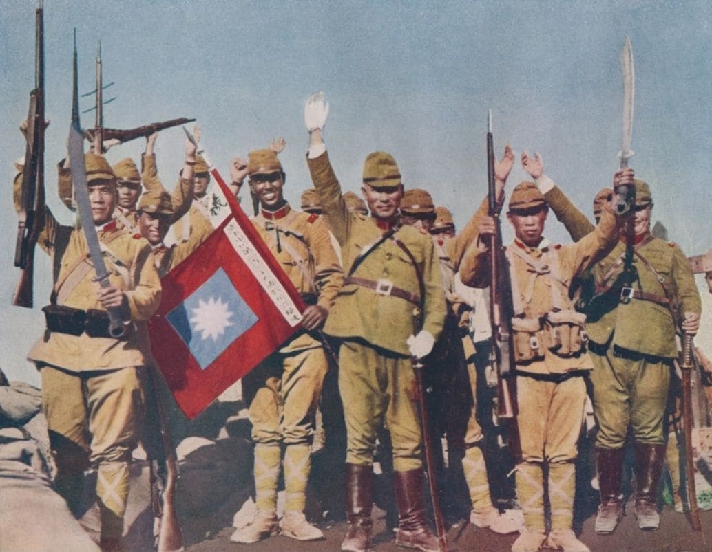 General Koji Sakai (center) celebrates victory with infantrymen of the Imperial Japanese Army 1st Independent Mixed Brigade, after the capture of Peking, 1937..jpg