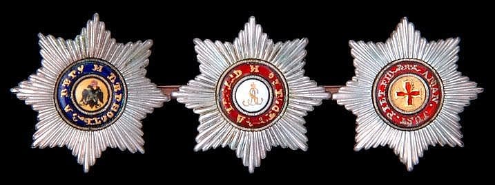 gold brooche  mounted with miniature breast stars of the Russian Orders.jpg