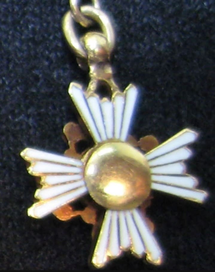 Gold chain of five miniatures that  belong to William Henry Cornwell.jpg