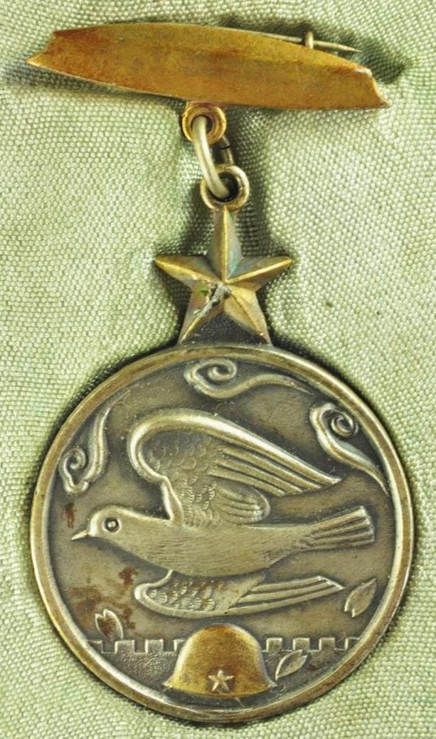 大東亜戦争殉國章  Great East Asia War Dying  for the Country Badge.jpg