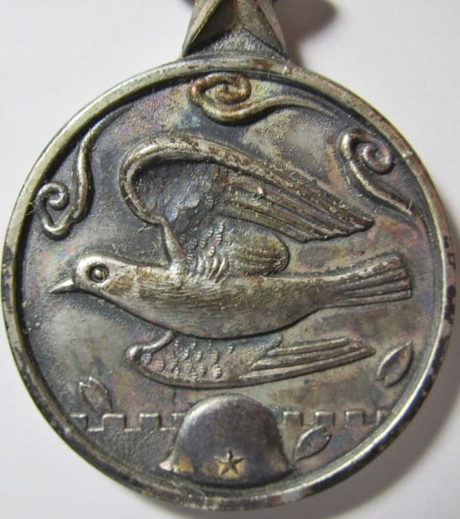 大東亜戦争殉國章  Great East Asia War Dying  for the Country Badge.jpg