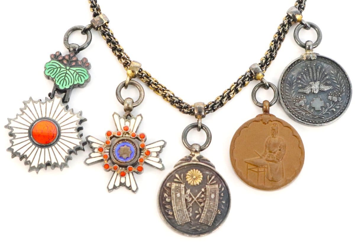 Group of japanese award miniatures made by Sugimura.jpg