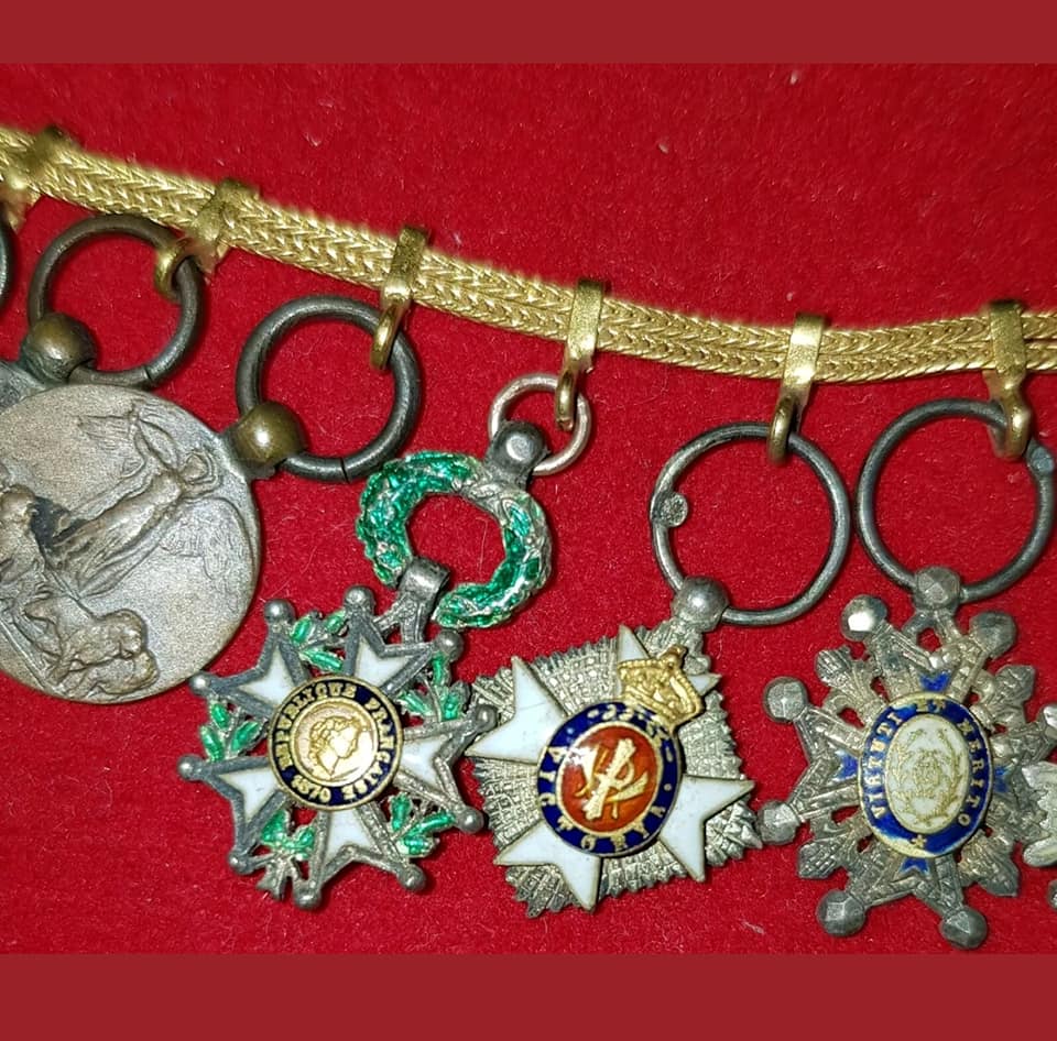 Group  of miniature awards with Sacred Treasure order breast star and Double Dragon.jpg