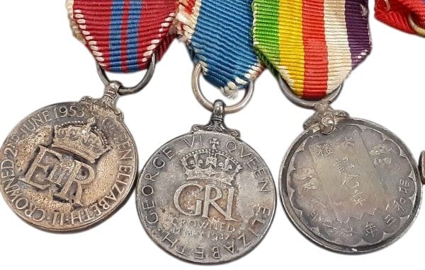 Group of miniatures awards that belonged  to an unidentified Japanese diplomat.jpg