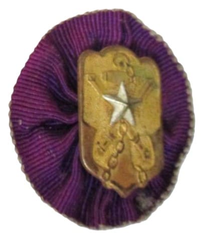 Imperial Military Reservist Association Badge with dark purple Rosette.jpg