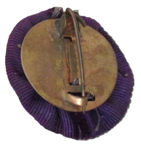 Imperial Military  Reservist Association Badge with dark purple Rosette.jpg