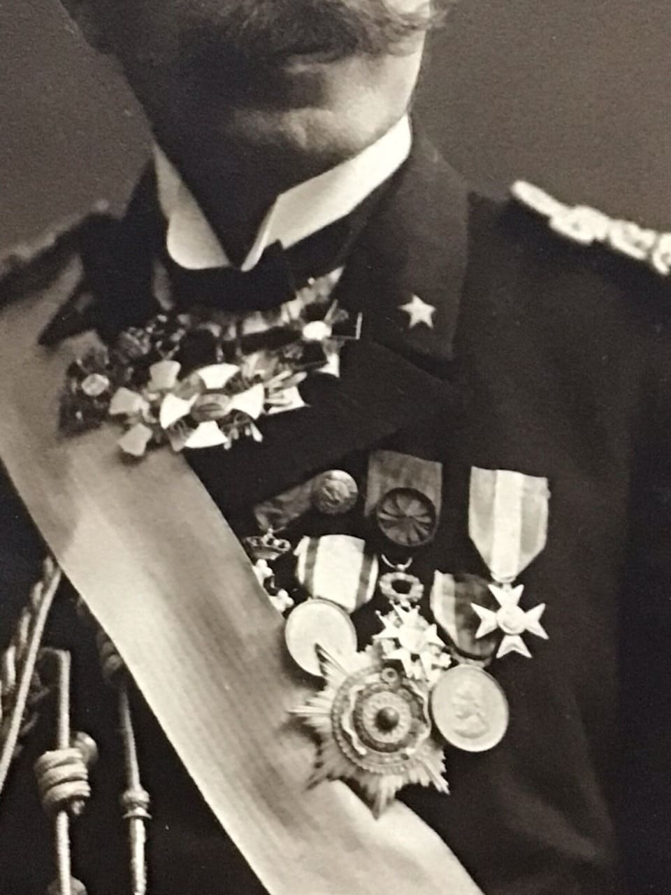 Italian admiral with a Double Dragon order breast star.jpeg