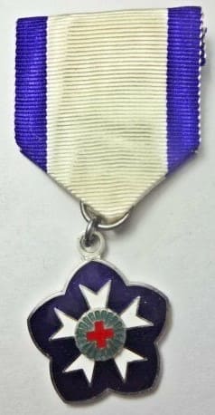 Japan Red Cross Сharity  Association 10th Anniversary Medal.jpg