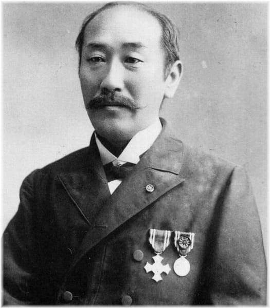 Japanese Civilian  with Red Cross Decorations.jpg