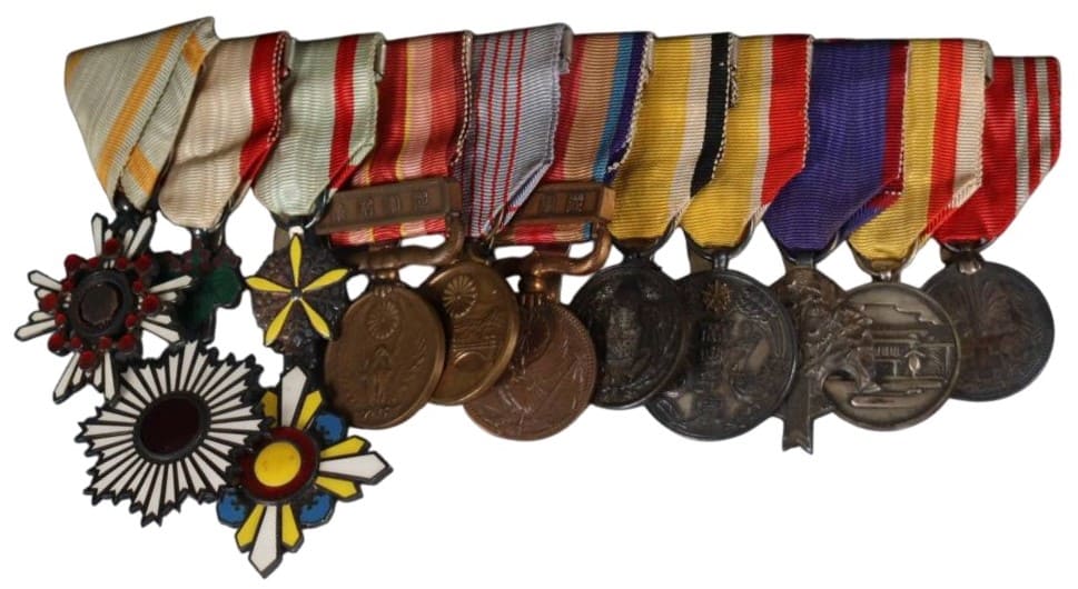 Japanese medal bar with 5th class Auspicious Clouds order.jpg